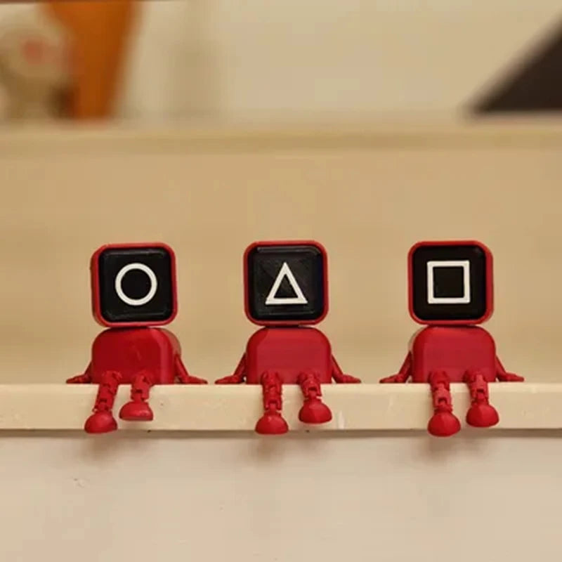 Squid Game Triangle Guard Collectible Toy – Red Edition